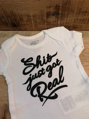 Shit Just Got Real Onesie - All Decked Out Events