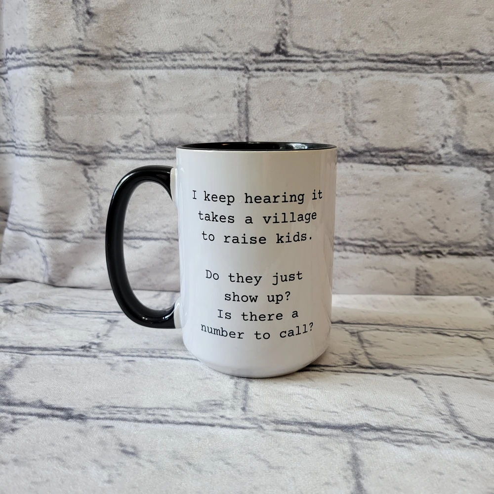 I Keep Hearing It Takes A Village / 15oz Mug - All Decked Out