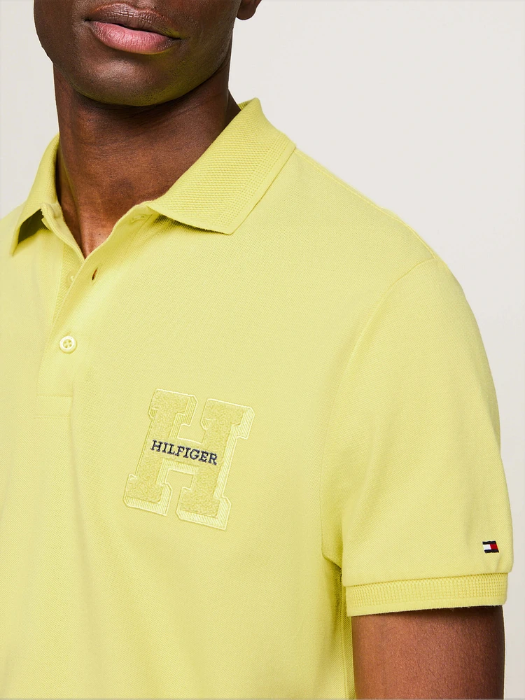 Polo con logo de rizo y corte regular hombre