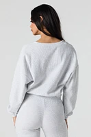 Chandail en molleton tricot gaufré et col V