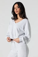 Chandail en molleton tricot gaufré et col V