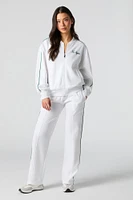 Pantalon d'entraînement Active en molleton avec motif brodé LA