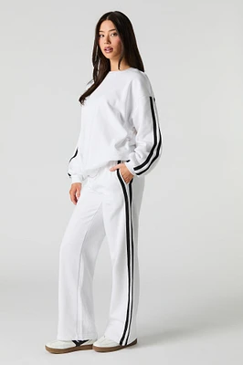 Pantalon d'entraînement en molleton avec rayures latérales
