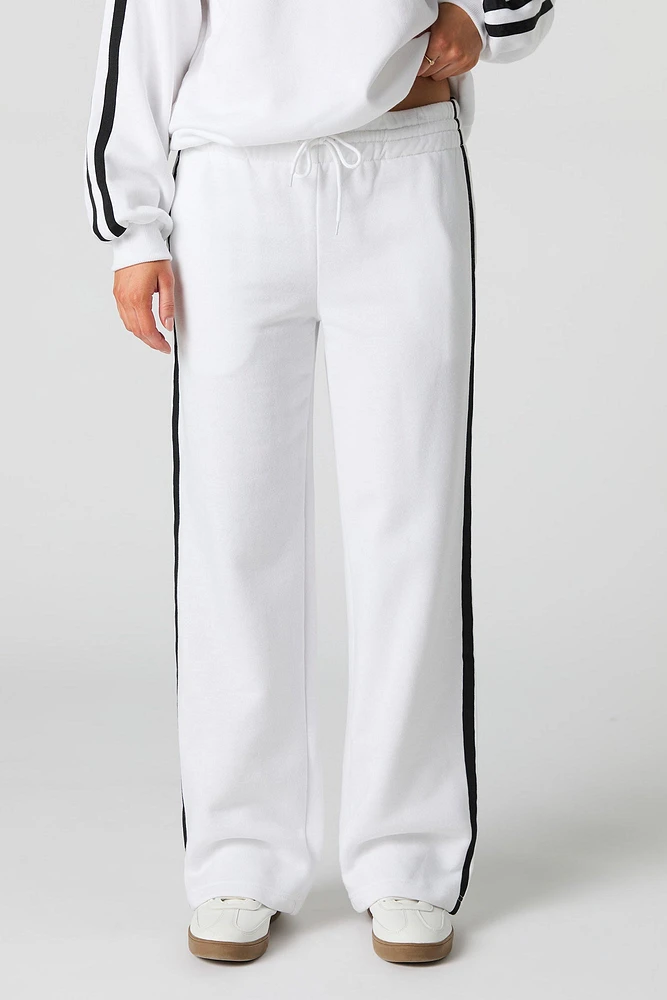 Pantalon d'entraînement en molleton avec rayures latérales