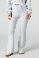 Pantalon en molleton tricot gaufré à jambe évasée