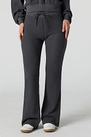 Pantalon en molleton tricot gaufré à jambe évasée