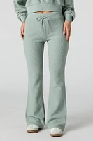 Pantalon en molleton tricot gaufré à jambe évasée