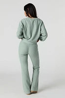 Pantalon en molleton tricot gaufré à jambe évasée