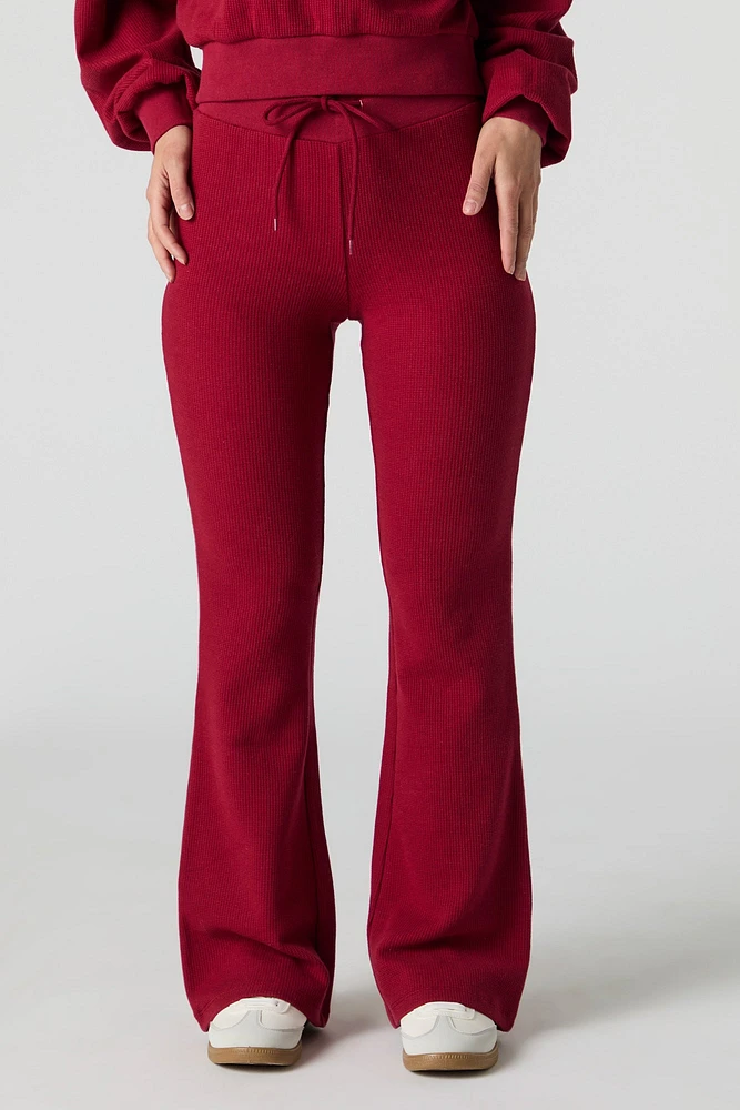 Pantalon en molleton tricot gaufré à jambe évasée
