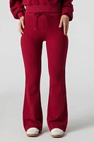 Pantalon en molleton tricot gaufré à jambe évasée