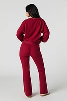 Pantalon en molleton tricot gaufré à jambe évasée