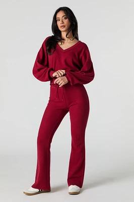 Pantalon en molleton tricot gaufré à jambe évasée