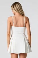 Combi-short plissé avec attache et ourlet de dentelle
