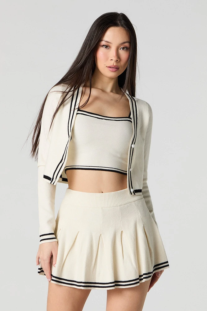 Jupe-short de tennis plissée avec liséré en tricot rayé