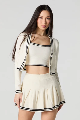 Jupe-short de tennis plissée avec liséré en tricot rayé