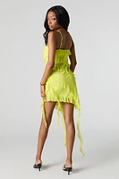 Minirobe asymétrique volantée en filet