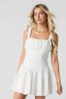 Minirobe ajustée et évasée ruchée à ourlet bulle