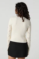 Cardigan en tricot côtelé fleuri avec motif brodé et attache avant