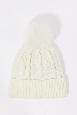 Tuque en tricot torsadé avec pompon