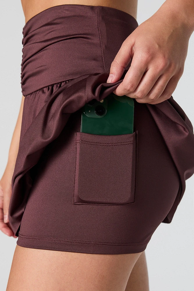 Jupe-short Active ruchÃ©e avec poche pour tÃ©lÃ©phone