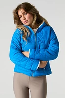 Blouson bouffant réversible en nylon et Sherpa