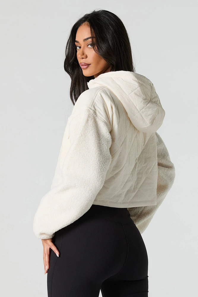 Blouson matelassé avec manches en Sherpa