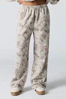 Pantalon d'entraînement à jambe large en molleton avec motif camouflage