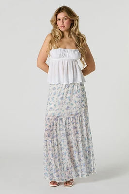Jupe maxi volantée fleurie en filet