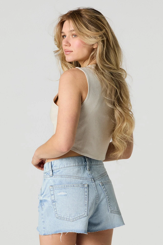 Short en denim d'aspect usé délavé pâle