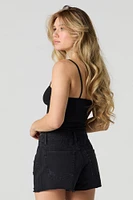 Short en denim d'aspect usé délavé noir