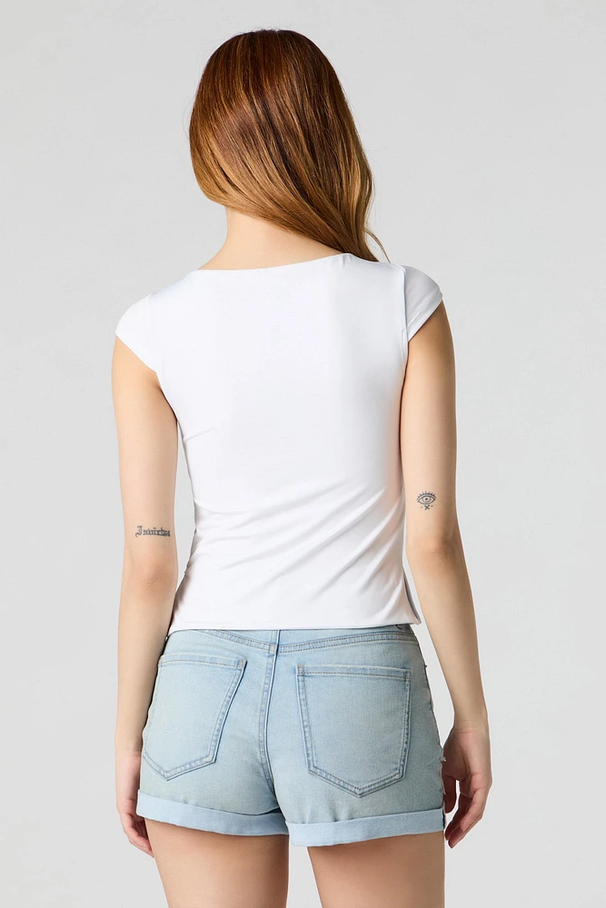 Short en denim d'aspect usé délavé pâle à taille haute