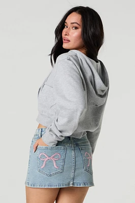 Minijupe-short en denim avec poches arrière brodées
