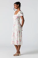 Robe midi fleurie à manches bouffantes et décolleté en coeur