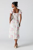 Robe midi fleurie à manches bouffantes et décolleté en coeur