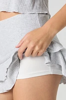Minijupe-short volantée en tricot de pointelle