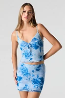Minijupe en filet fleuri superpos