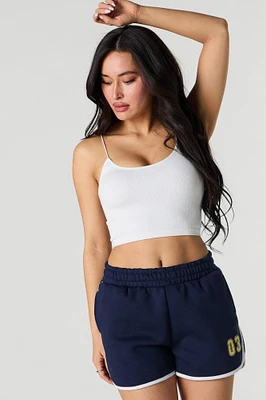 Short en molleton avec motif brodé et ourlet arrondi