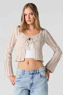 Chandail asymétrique en tricot ajouré avec attache