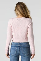 Cardigan écourté en tricot pointelle boutonn