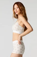 Ensemble deux pièces soutien-gorge-camisole et short garçonne