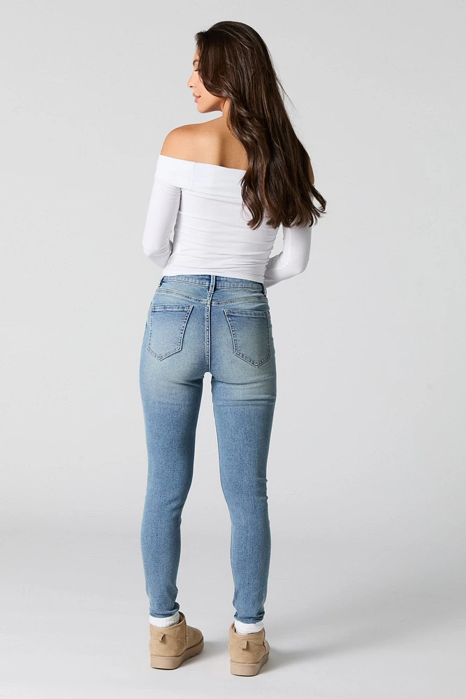 Jean ajusté extensible taille haute délavé moyen