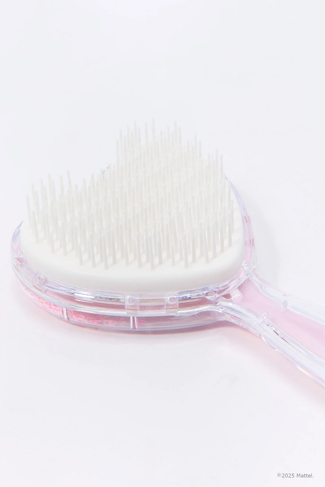 Brosse Barbie™ en forme de  coeur avec confettis