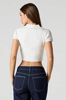 Polo boutonné en tricot côtel