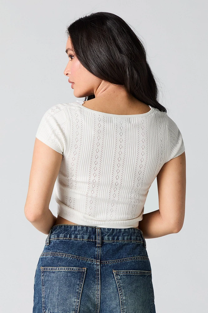T-shirt écourté en tricot pointelle à bordure dentelle