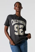 T-shirt de coupe garÃ§onne dÃ©lavÃ© Ã  imprimÃ© California 92