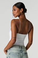 Maillot profilé à encolure en V et liséré de dentelle