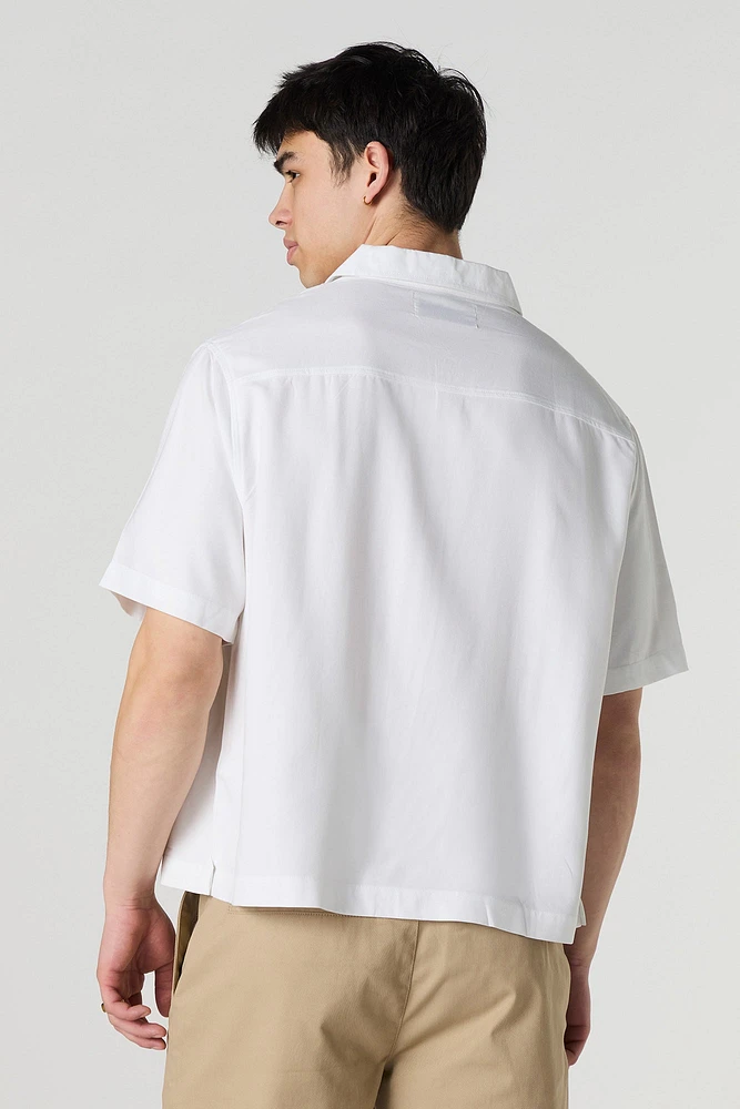 Haut carré boutonné à manche courte