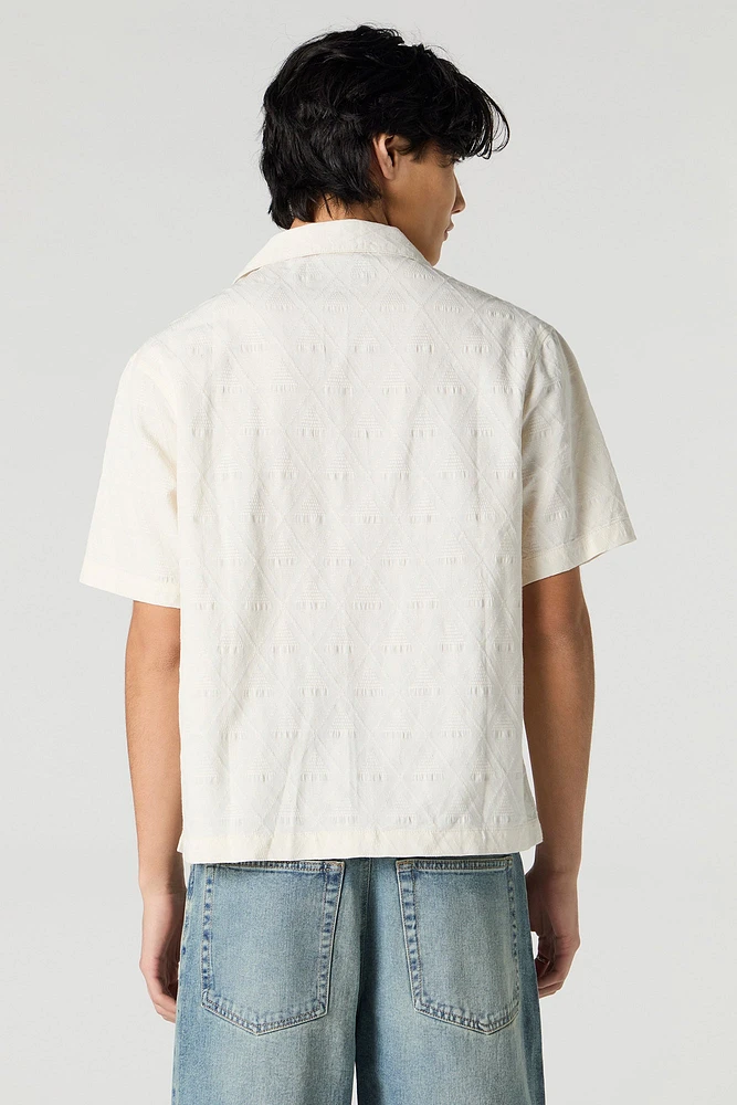 Haut boutonné texturé avec motif de losanges
