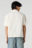 Haut boutonné texturé avec motif de losanges