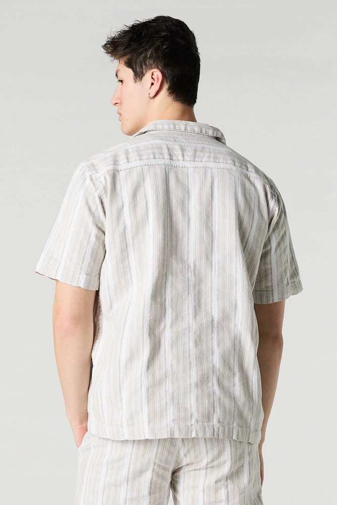 Haut boutonné en tricot rayé